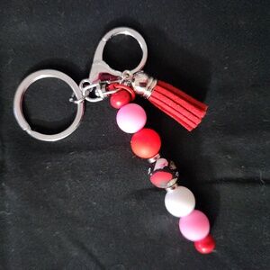 Elegant Red and Pink Beaded Keychain with Tassel